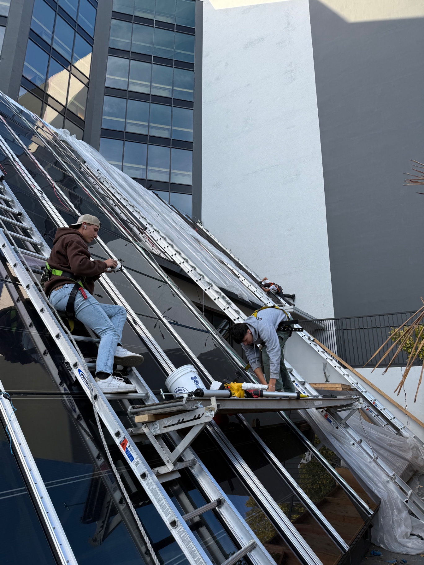 Coordinated glazing install on an atrium roof