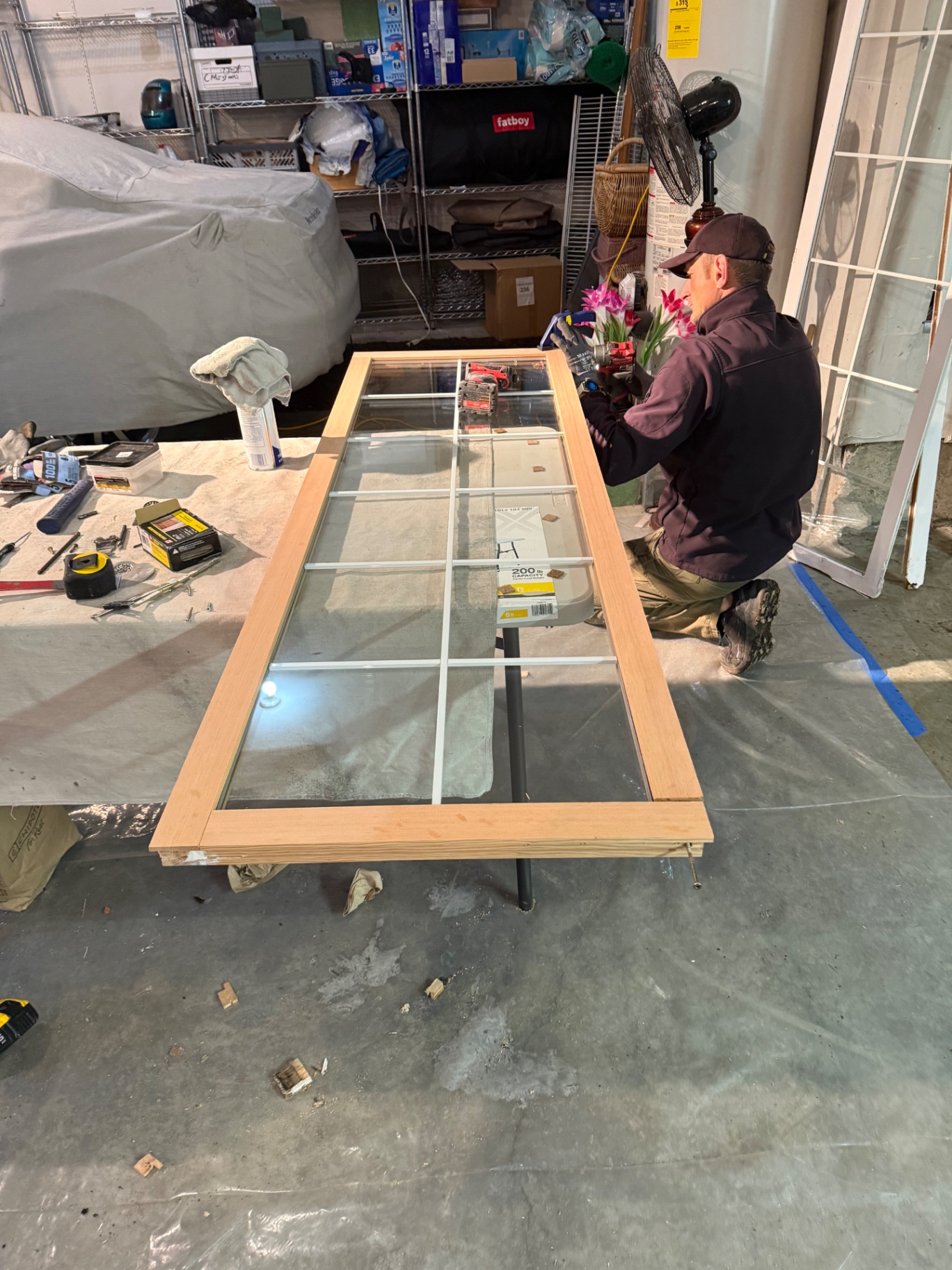 Craftsman rebuilding a divided-lite wood sash